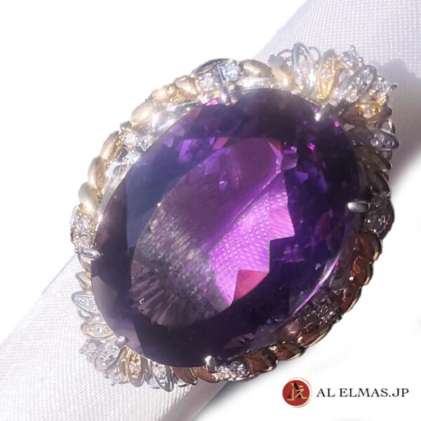 52.95ct natural amethyst accented with 0.38ct diamonds.