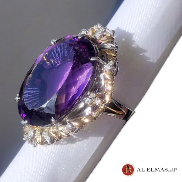 52.95ct natural amethyst accented with 0.38ct diamonds.