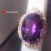 52.95ct natural amethyst accented with 0.38ct diamonds.