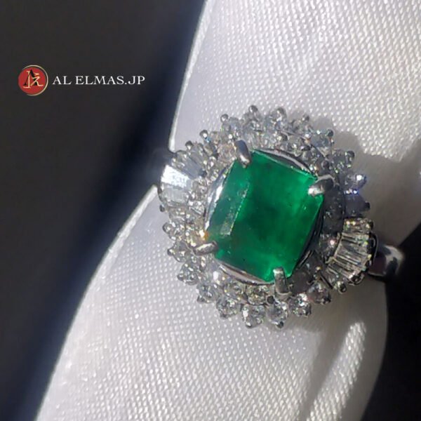 Luxury PT900 platinum ring with a 1.359ct natural emerald and 0.60ct diamonds, weighing 9.55 grams.
