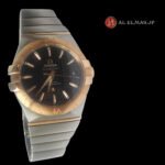Omega Constellation Co-Axial Chronometer watch with black textured dial, rose gold bezel, date display, and stainless steel and rose gold integrated bracelet.